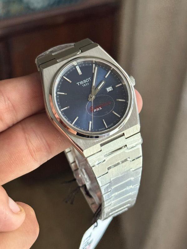 PRX blue plain dial